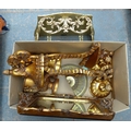A quantity of modern ornaments, including a pair of French gilded urns with cherub finials to the co... 