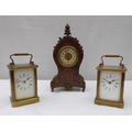 A French late 19th century boullework mantle clock, of ogee form, with bronze mounts, by R & Co, Par... 