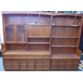 Two 1970's G-plan pieces of furniture, comprising a bookcase and a sideboard, a/f condition. (2)