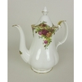 A large Royal Albert part dinner service in the Old Country Roses pattern, comprising teapot, coffee... 