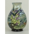 A Moorcroft Islay pattern baluster vase, the body decorated with shells and seaweed, coastline beyon... 