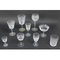 A large collection of Waterford Crystal drinking glasses,  including a suite of table glasses compri... 