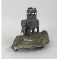 An unusual late 19th or early 20th century brass and white metal inkwell, formed as a silvered eleph... 