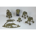 A collection of four Benin style bronze and brass elephants, all with mahouts and one with howdah, c... 