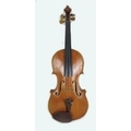 An early 20th century 4/4 violin, paper labels to the interior, one written and printed 'Robert Raeb... 