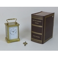 A 20th century carriage clock by Matthew Norman, the white dial with black Roman numerals and minute... 