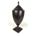 A 19th century mahogany pedestal urn knife box, the lid lifting to reveal fitted interior, 25 by 60c... 