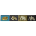 A set of four late 19th or early 20th century Spanish plaques of elephants, purportedly made in hono... 