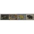 A set of four late 19th or early 20th century Spanish plaques of elephants, purportedly made in hono... 