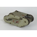 A Louis Marx & Co tin plate clockwork model WWI 'turnover tank' toy, circa 1932, with grey body and ... 