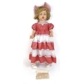 A vintage 1951 Mark Payne walking and talking doll, with wind up mechanism to the stomach, blonde he... 