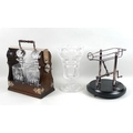 A modern silver plated tantalus, wine pourer and Waterford crystal vase, the lockable mahogany tanta... 