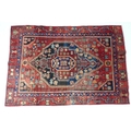 A Hamadan rug with red ground, #5603, 182 by 125cm.