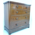 A Victorian mahogany chest of two over three graduating drawers with turned handles, 117 by 53.5 by ... 