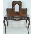 A 19th century French ebonised and crossbanded bonheur du jour, with gilt metal applied decoration, ... 