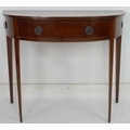 An early 19th century mahogany and line inlaid demi lune side table, single drawer with cast ring ha... 