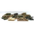 A collection of plastic military models of tanks, anti aircraft guns, trucks and personnel, late 20t... 