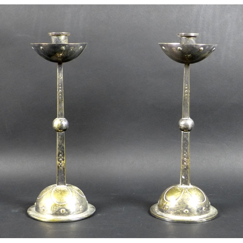 2 - A pair of WMF Jugendstil silver plated on brass Arts & Crafts candlesticks, circa 1915, with hemisph... 