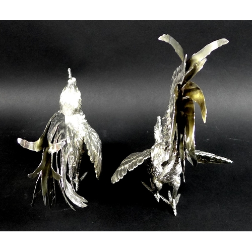 1 - A pair of silver fighting cockerels, each cast with feathered detailing, London import mark, 1957, J... 