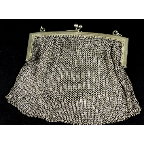 19 - A silver mesh evening purse, London import 1912, Paul Ettlinger, 4.5toz, together with a black lacqu... 