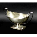 A Victorian silver twin handled boat shaped pedestal dish, angular twin handles, London 1895, Charle... 