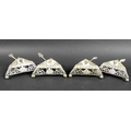 A set of four Victorian salts of pyramidal form with pierced sides, with a set of four spoons, a/f, ... 