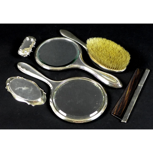 52 - A selection of silver and silver backed dressing table items, comprising a silver backed hairbrush, ... 