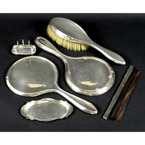 52 - A selection of silver and silver backed dressing table items, comprising a silver backed hairbrush, ... 