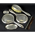 A selection of silver and silver backed dressing table items, comprising a silver backed hairbrush, ... 