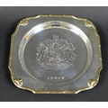 An Elizabeth II silver salver commemorating her Silver Jubilee, 9ct gold reeded rim with stylised oa... 