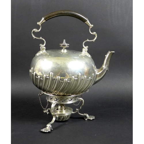 76 - A Victorian silver spirit kettle on stand, the compressed globular body with wrythen lobed detailing... 