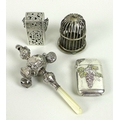 A group of silver and plated vertu, comprising a silver and mother of pearl teething rattle, Birming... 