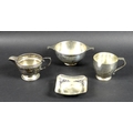A group of silver items, comprising a silver quaich, plain form, the bowl engraved EMM, Sheffield 19... 