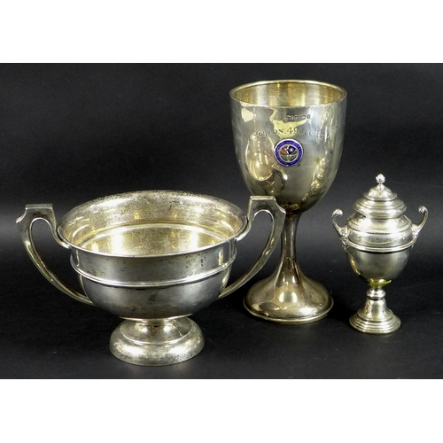 33 - A group of three Edwardian silver sporting trophies awarded to Tom Morton, comprising a twin handled... 