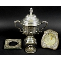 An Edwardian silver golfing trophy, of twin handled urn form with cover, entitled 'The Houldsworth F... 