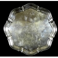 A George V silver salver presented by Birkdale Golf Club, with pie crust edge, raised on four legs, ... 