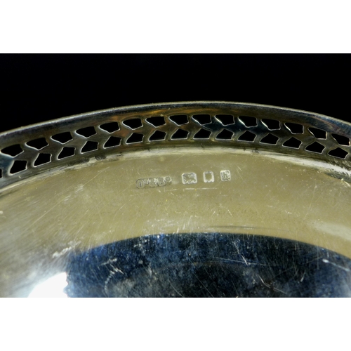 56 - A group of Victorian and later silver, comprising a salver with pierced rim, monogram engraved, rais... 
