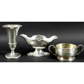 A group of Edwardian and later silver, comprising a Rococo style sauce boat on stand, London 1905, H... 