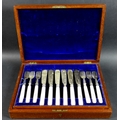 A set of Edward VII silver fish eaters, twelve place settings of knives and forks, with ivory handle... 