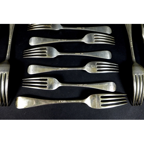 50 - A set of six Edward VII silver table forks and six dessert forks, Old English pattern, terminals eng... 