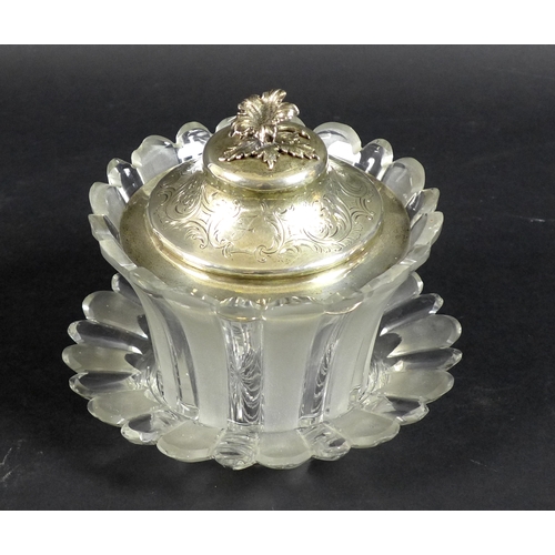 58 - A Victorian silver and cut glass bon bon dish and stand, the silver domed circular lid with cast flo... 
