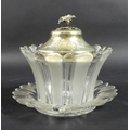 A Victorian silver and cut glass bon bon dish and stand, the silver domed circular lid with cast flo... 