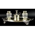 A George III and Victorian silver desk stand of oval twin handled form, with swag decoration within ... 