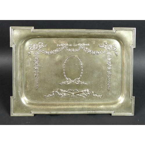 53 - A George V rectangular silver tray, the body decorated with floral swags, bows, ribbons and torches,... 