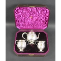 A Victorian silver bachelor's three piece tea service, comprising teapot, milk jug and sucrier, the ... 