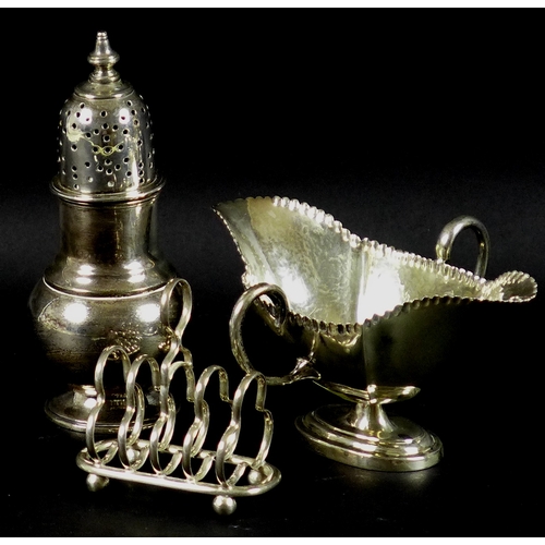 65 - A group of three Victorian and Edwardian silver items, comprising a sugar castor, Pairpoint Brothers... 