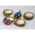 A group of 9ct gold dress rings, comprising a pink stone ring, size N, a further pink stone cluster ... 