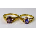 An 18ct gold dress ring set with diamonds and a pear cut tanzanite, size N, together with an 18ct go... 
