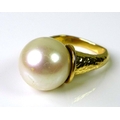 A 14ct gold and pearl designer ring, marked Bagge, likely for Eric Bagge (1890-1978), of modernist o... 