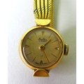 A 9ct gold ladies cocktail watch, 'Bentima Star', the 9ct gold bracelet with safety chain, cream dia... 
